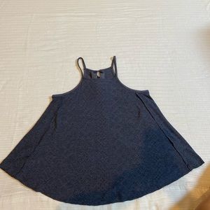 Blue tank top with lace up back.